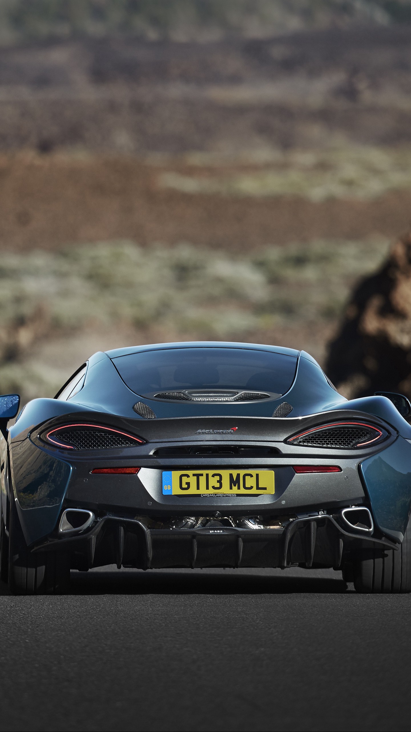 Обои на телефон mclaren, 570gt, авто, дорога, вид сзади - скачать бесплатно  в высоком качестве из категории 